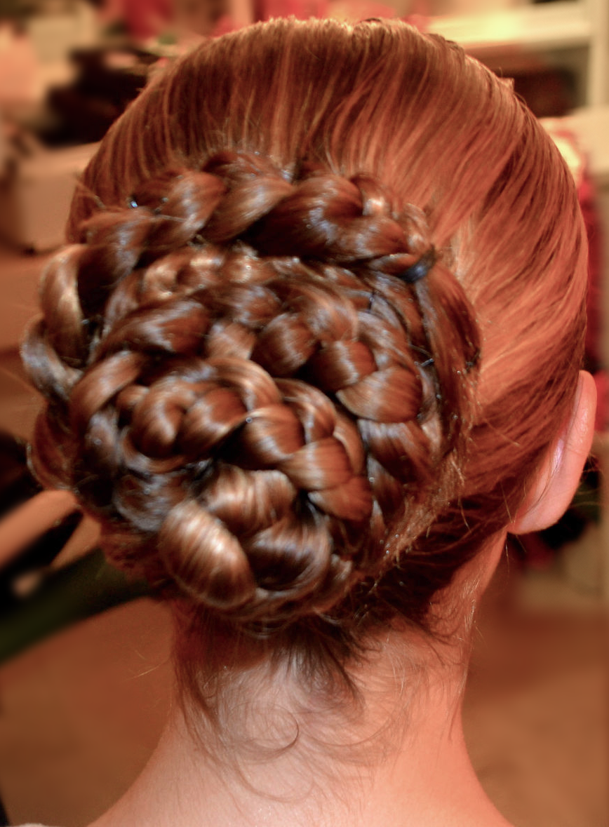 Interwoven runway updo · back view · TEXTURES Hair Salon