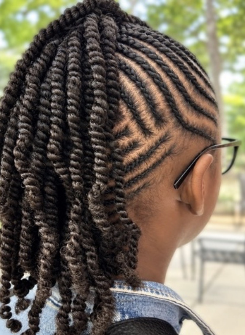 Cornrows with a twisted ponytail by Dee