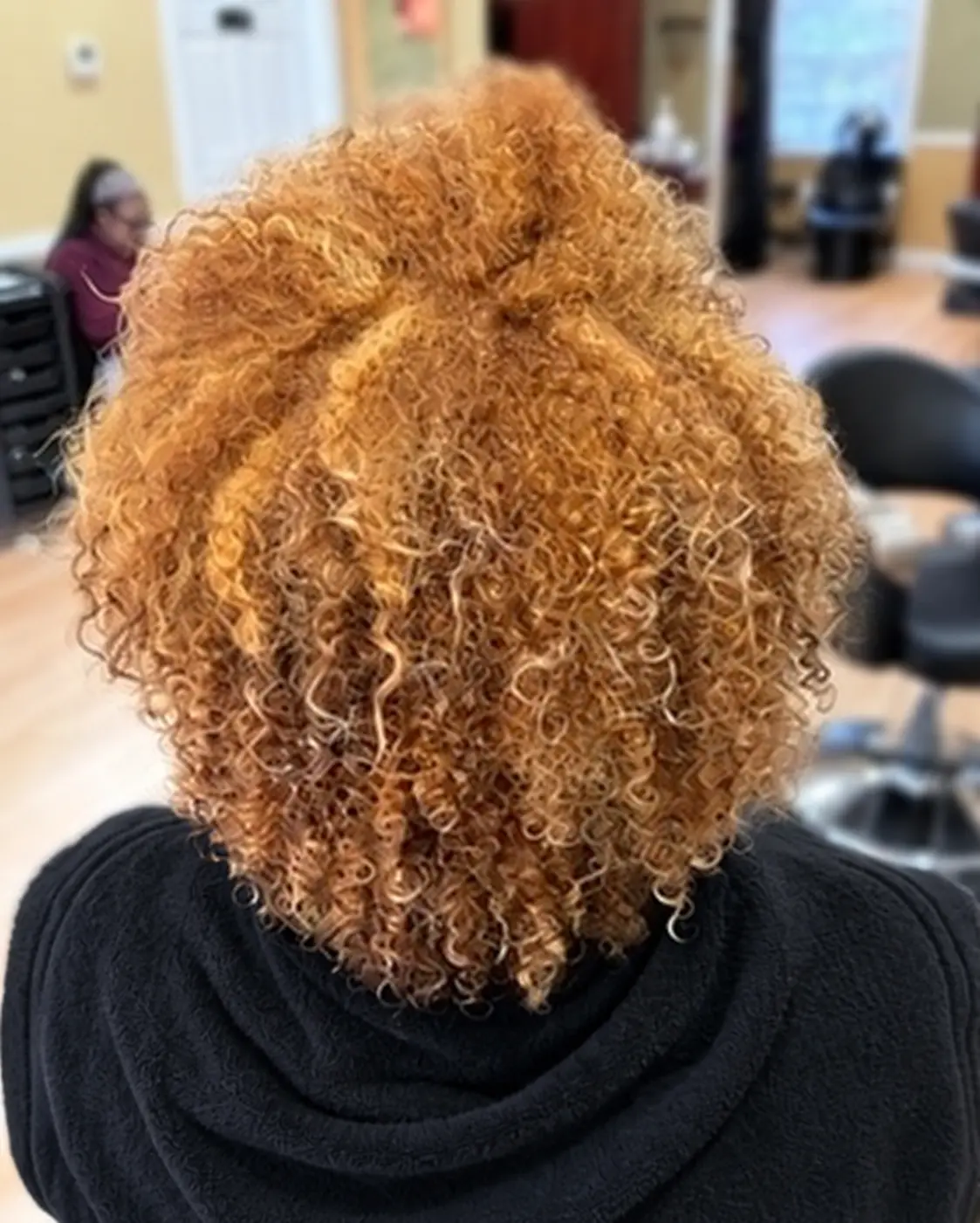 Golden natural curls at TEXTURES Hair Salon