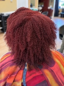Burgundy textured style at TEXTURES Hair Salon