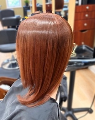 Copper angled bob at TEXTURES Hair Salon