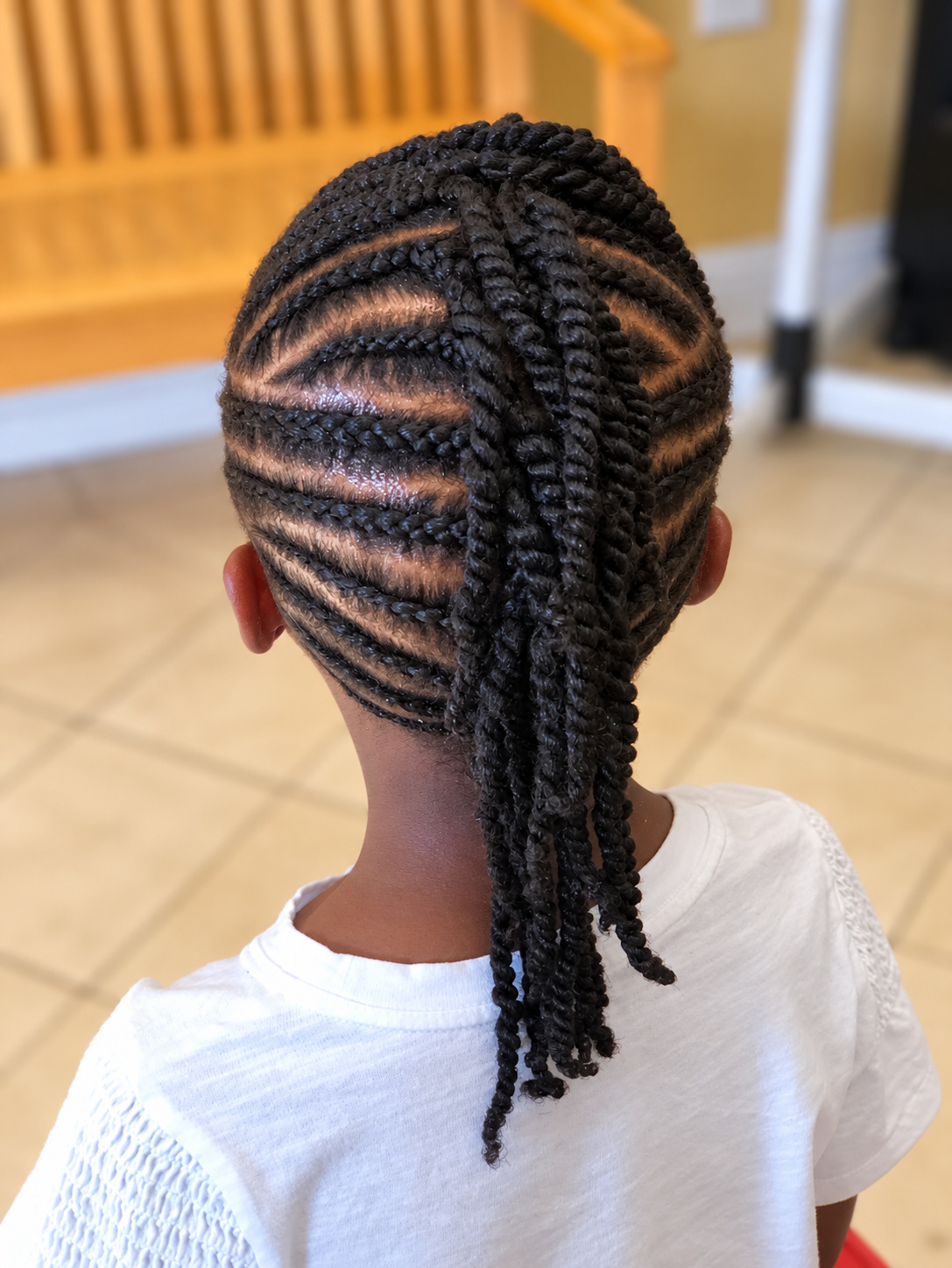 Kids’ Hair · Braided mohawk, back view · TEXTURES Hair Salon