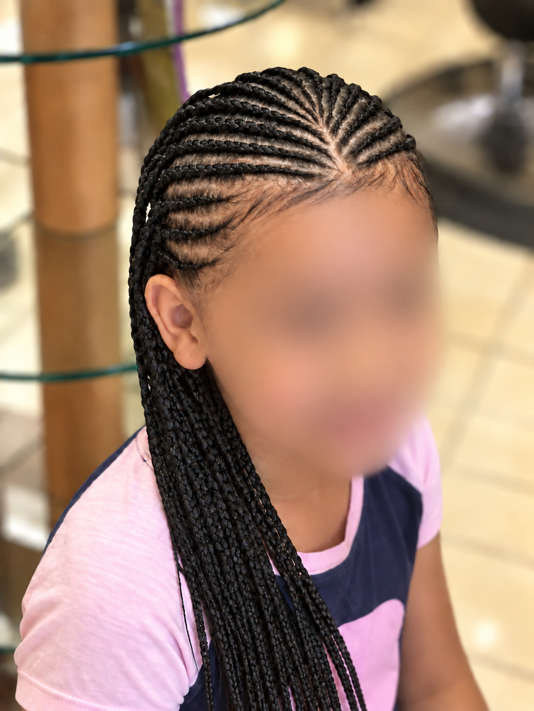 Kids’ Hair · Long fan-pattern cornrows · TEXTURES Hair Salon