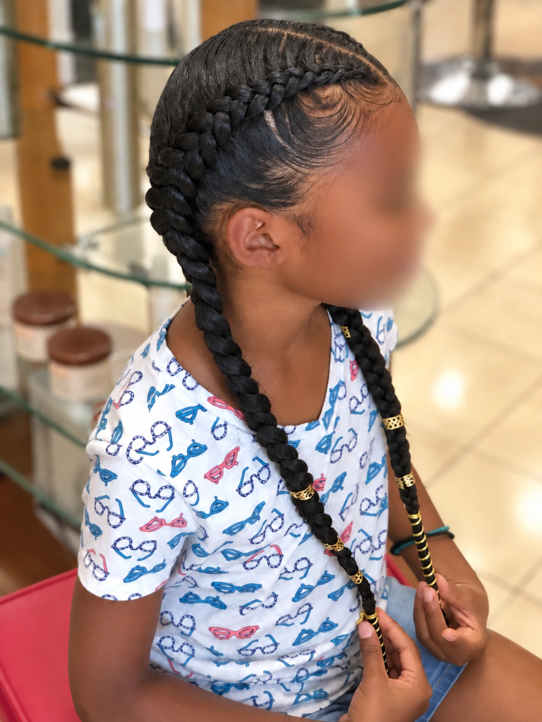 Kids’ Hair · Two braids with gold cuffs · TEXTURES Hair Salon