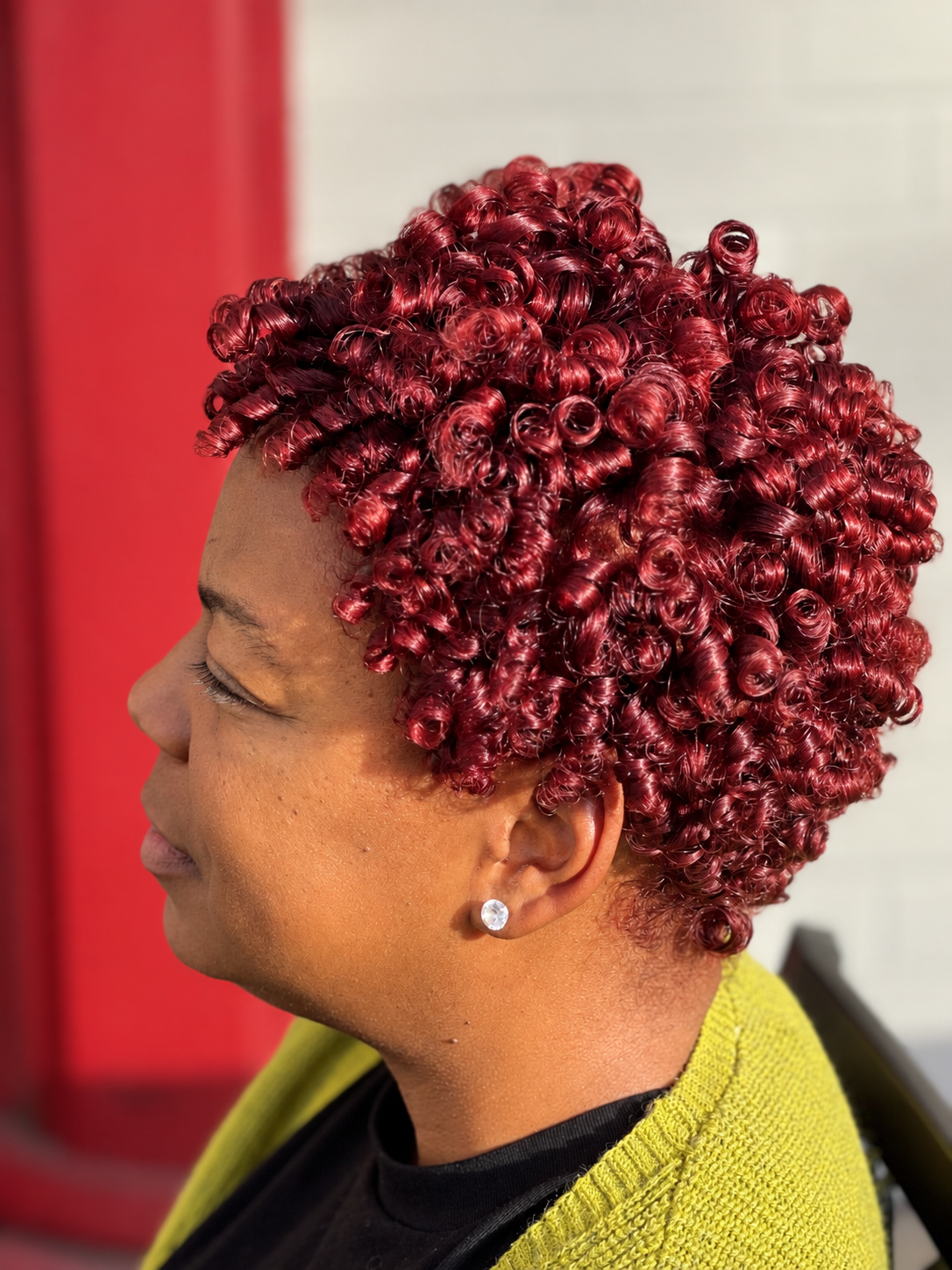 Burgundy defined curls by Patricia