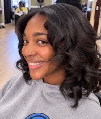 Shoulder-length curls at TEXTURES Hair Salon
