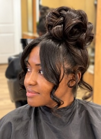 High curled updo at TEXTURES Hair Salon