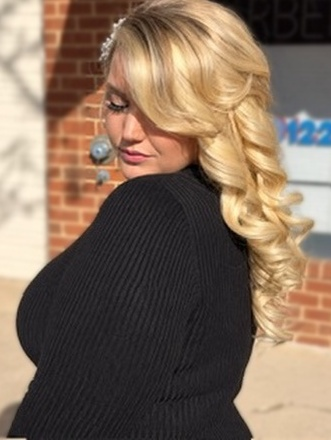 Long blonde curls at TEXTURES Hair Salon