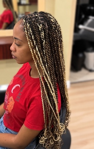 Long two-tone twists at TEXTURES Hair Salon