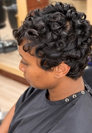 Short sculpted curls at TEXTURES Hair Salon