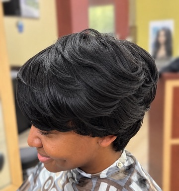Softly swept short layers at TEXTURES Hair Salon