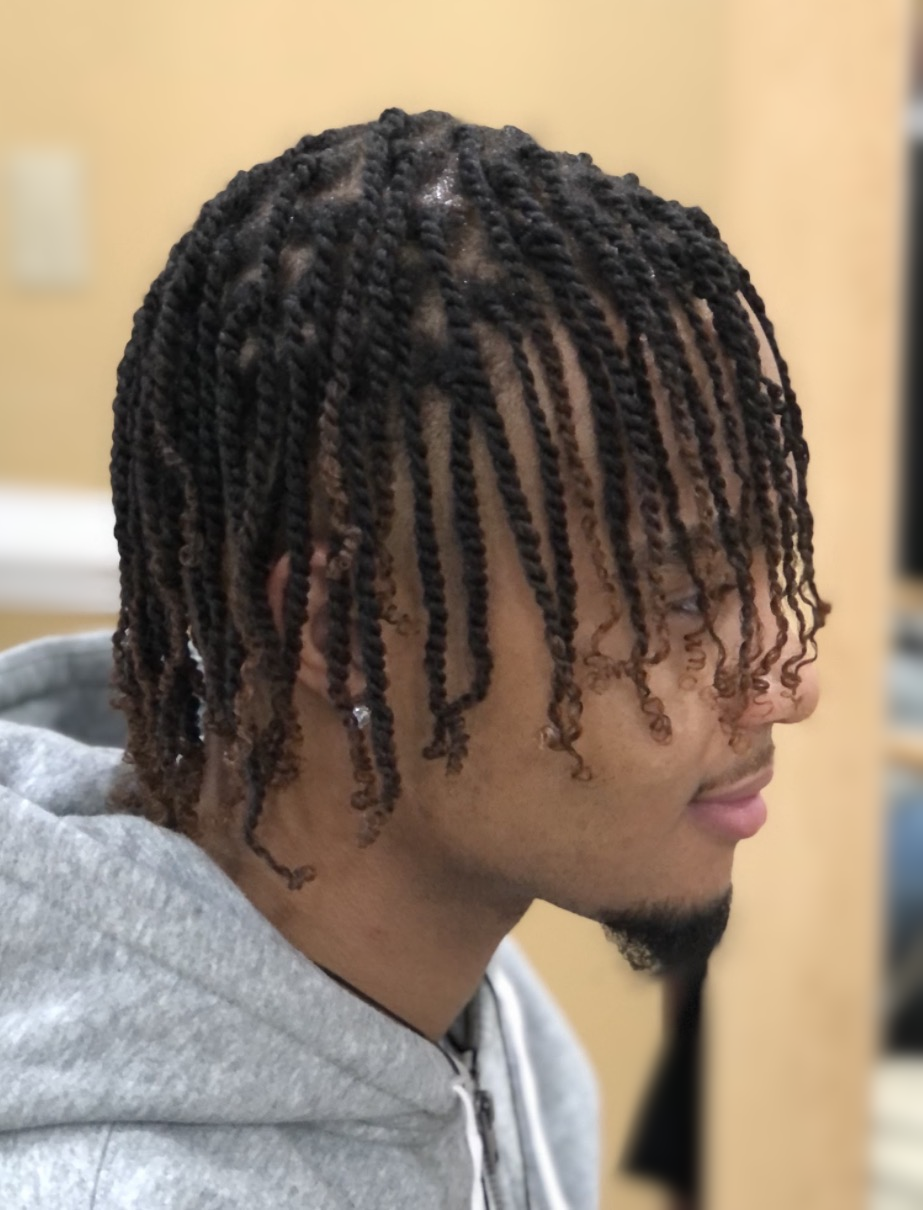 Two-strand twists with curled ends at TEXTURES Hair Salon